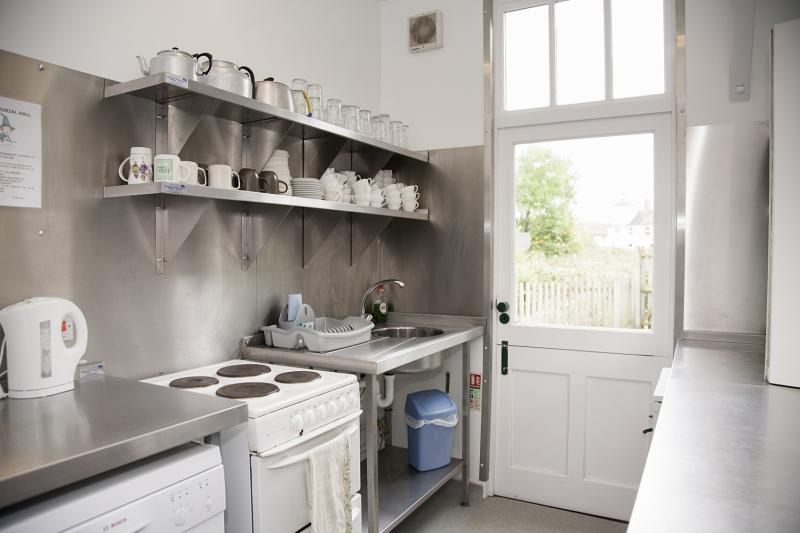 The compact kitchen at Mellis Memorial Hall